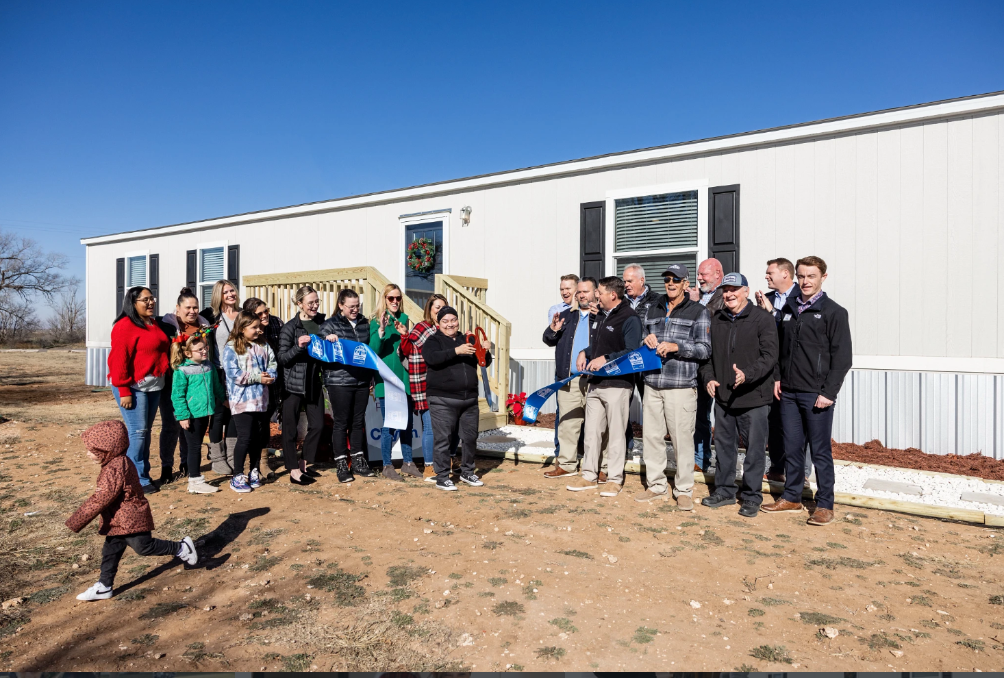 Ribbon cutting at Family Promise of Lubbock, TX home donation