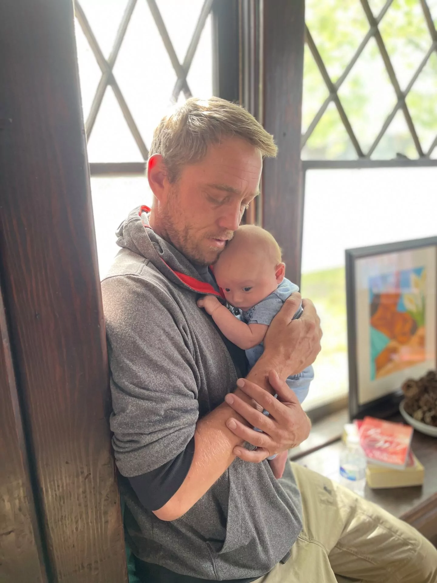 dad holding infant